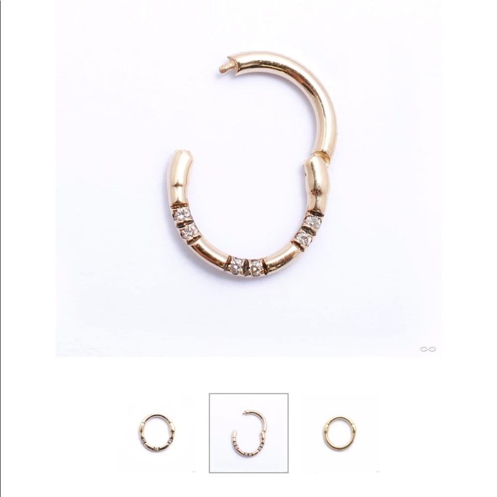 Solid gold clicker with genuine diamonds